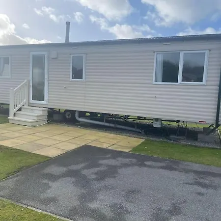 Vakantiehuis Delightful Two Bedroom Caravan On Beach. Par